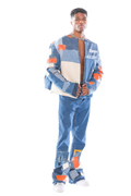 Person wearing a colorful outfit with a jacket and pants on a white background