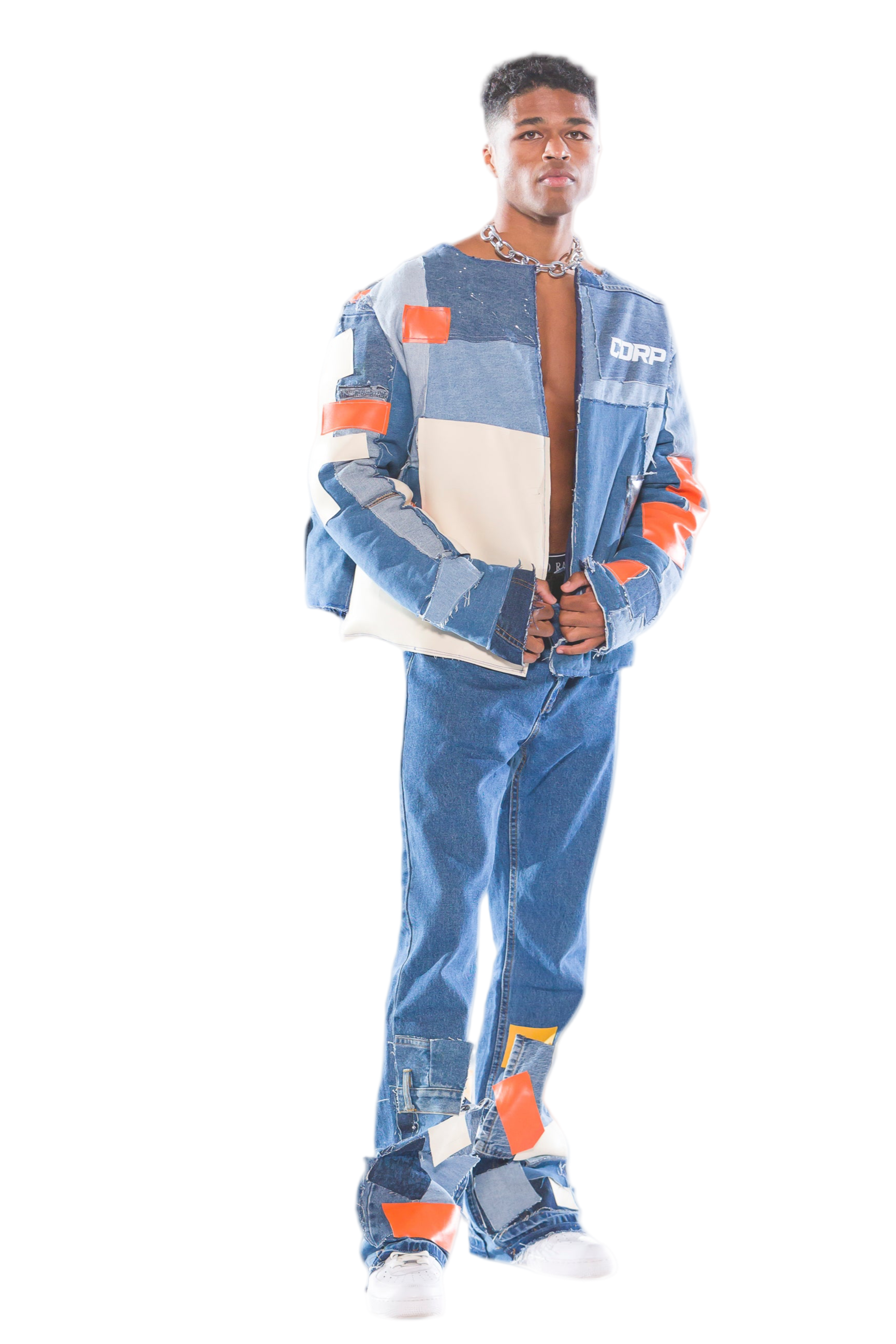 Person wearing a colorful outfit with a jacket and pants on a white background