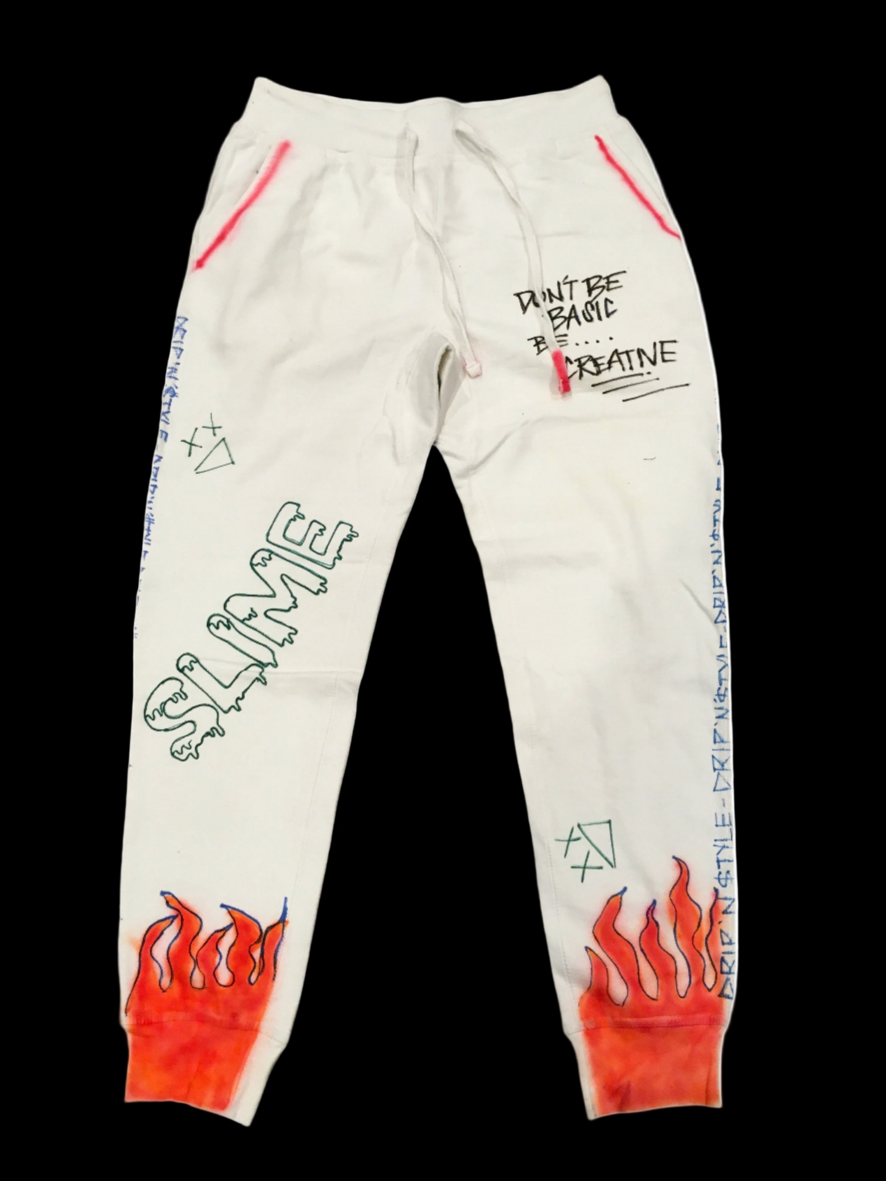 The Fire Flame Joggers feature a bold airbrushed flame design with vibrant colors. Made from soft, comfortable fabric, they offer a relaxed fit with an elastic waistband and cuffs, perfect for everyday wear or casual outings.