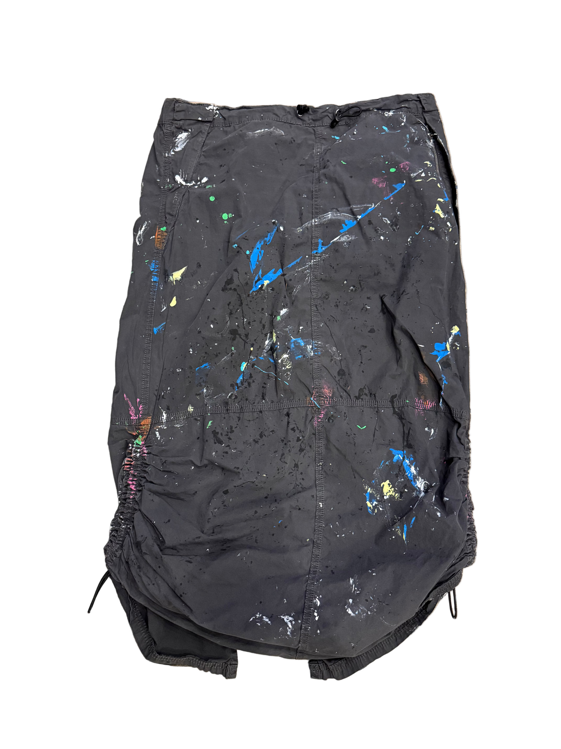 Black backpack with colorful paint splashes