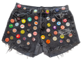 Black denim shorts with colorful bottle caps attached 