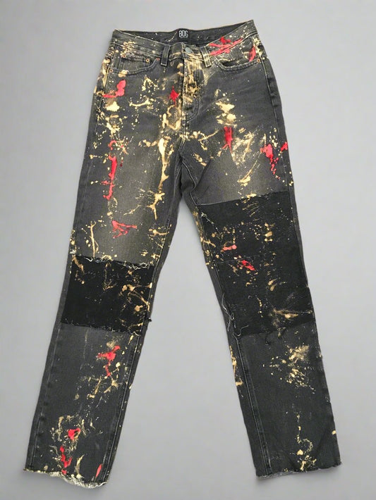 Black bleached denim jeans with red